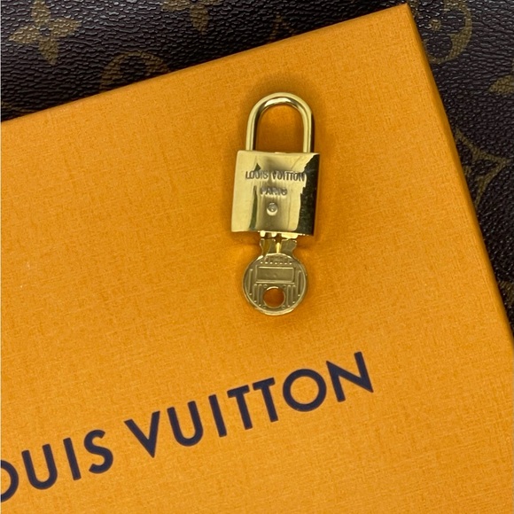 Authentic Louis Vuitton gold tone padlock/ lock and key #230 - Picture 2 of 3